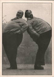 Two Smiling Large Men Leaning Back-to-Back Postcard
