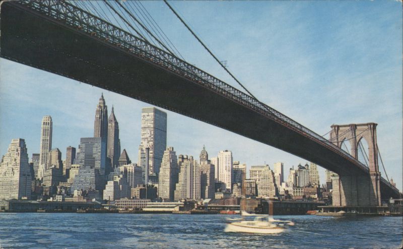 SKYLINE OF MANHATTAN FROM UNDER BROOKLYN BRIDGE New York