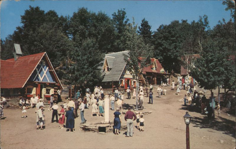 Santa's visitors, young and old, stroll through his village North Pole New York
