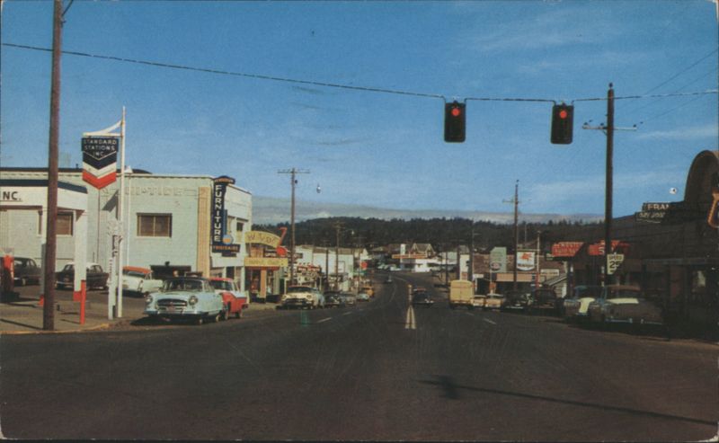 Main Street with Businesses and Traffic Lights Newport Oregon
