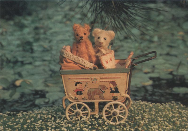 Two Teddy Bears in a Decorated Pram with Summer Teddies Theme