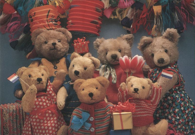 Teddy Bears in Festive Outfits with Dutch Flags and Tulips Holland