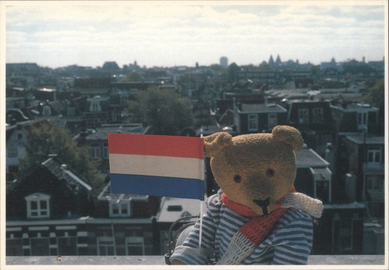 Teddy Bear with Dutch Flag Overlooking Amsterdam Netherlands