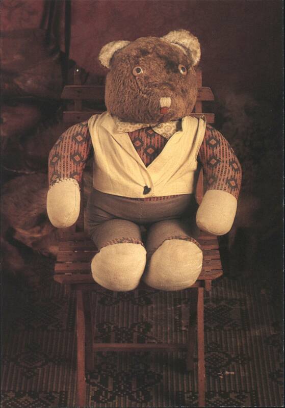 Teddy Bear in Vest Sitting on Wooden Chair Mirja De Vries