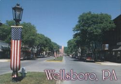 Main Street, Wellsboro, PA - State Laurel Festival Flags Postcard