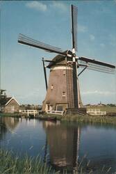 Dutch Windmill by Canal Postcard