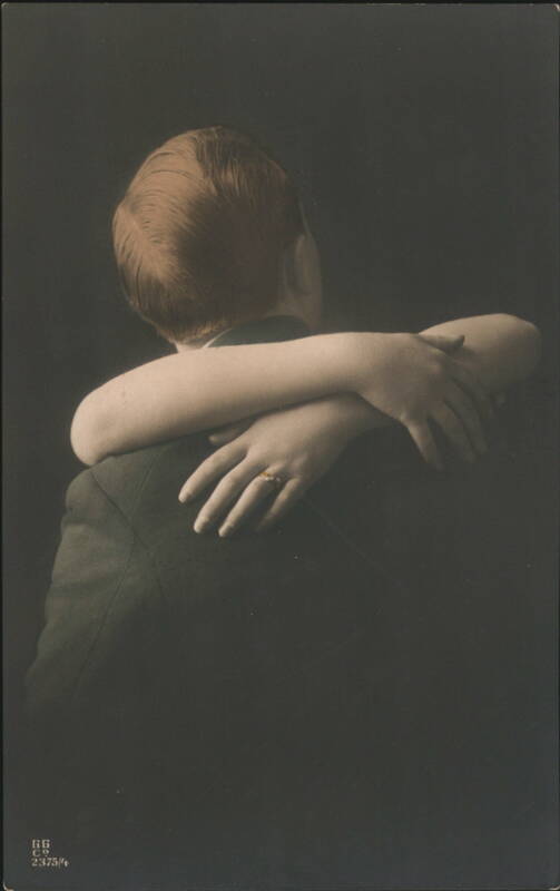 Man Embraced from Behind by Woman with Ring Couples