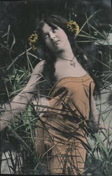 Woman with Yellow Flowers in Hair in Tall Grass Postcard