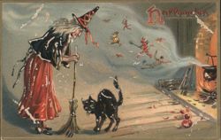 Witch with Broom and Black Cat by Fireplace Postcard