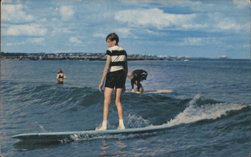 Surfer Riding Waves at Long Sands, York Beach Maine