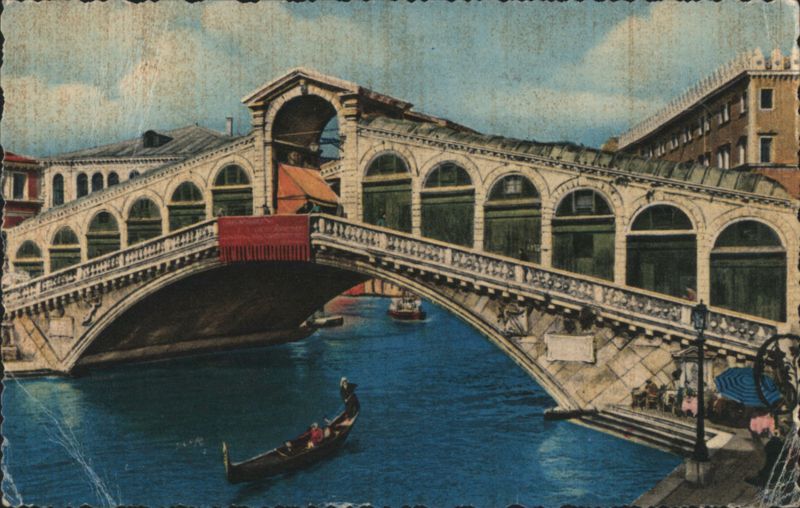 Rialto Bridge and Grand Canal with Gondola Venice Italy