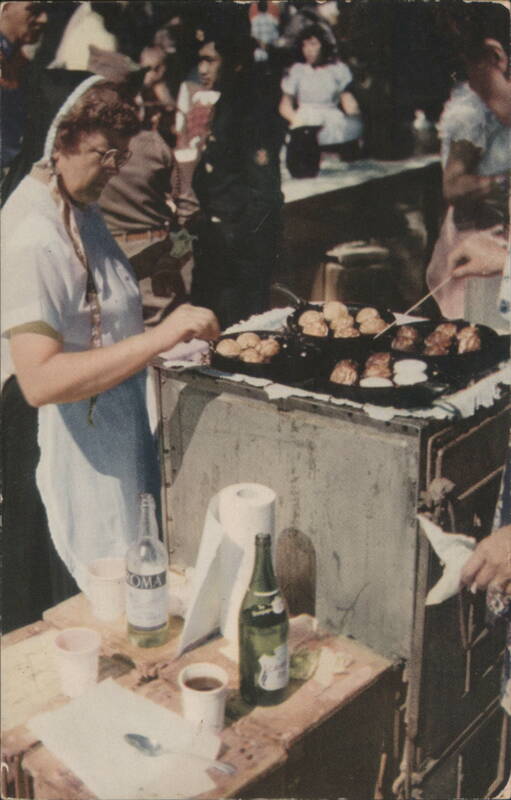Cooking Aebleskiver for Breakfast during Danish Days Solvang California