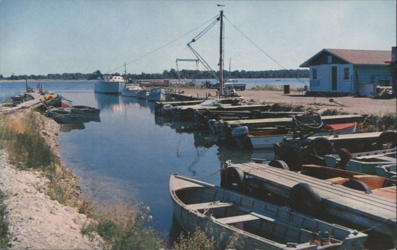 Dock View with Moored Boats and Shore Building Washington Island Wisconsin