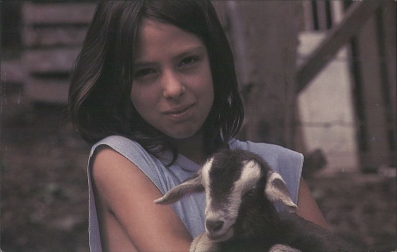 Girl with Dairy Goat, Heifer Project International