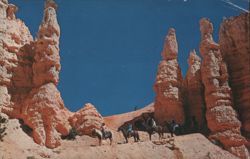 Horseback Riders on Trail among Bryce Canyon Hoodoos Postcard