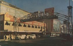 Reno Arch and Harold's Club Daylight Scene Postcard