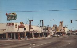 Main Street Scene with Piute Lodge Motel and Local Shops Postcard