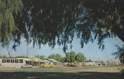 Street Scene with Drug Store and Pharmacy Postcard