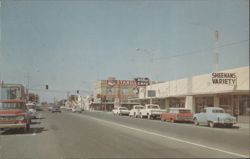 Main Street Scene with Sheehans Variety and Willcox Cafe Postcard