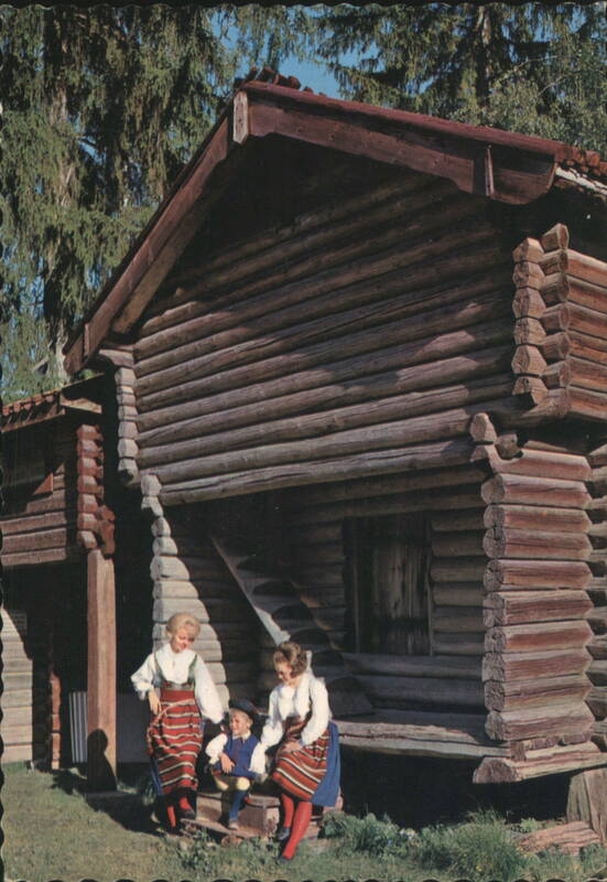Dalecarlia Old Log House and Traditional Folk Costumes Dala-Floda Dalarna Sweden