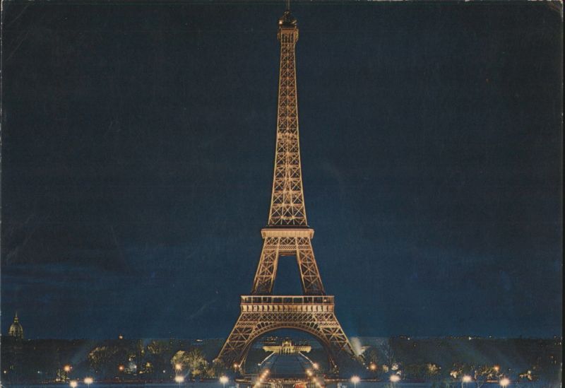 Eiffel Tower Illuminated at Night Paris France