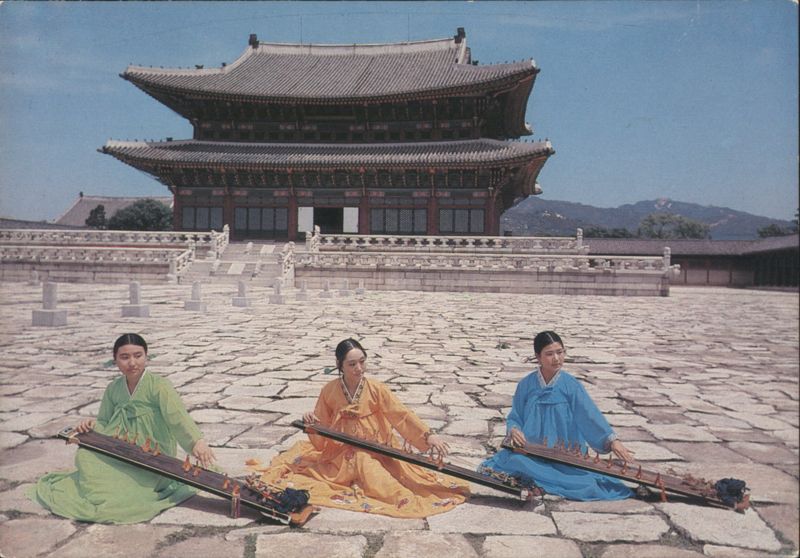 Women Playing Gayageum at Traditional Korean Palace Seoul South Korea