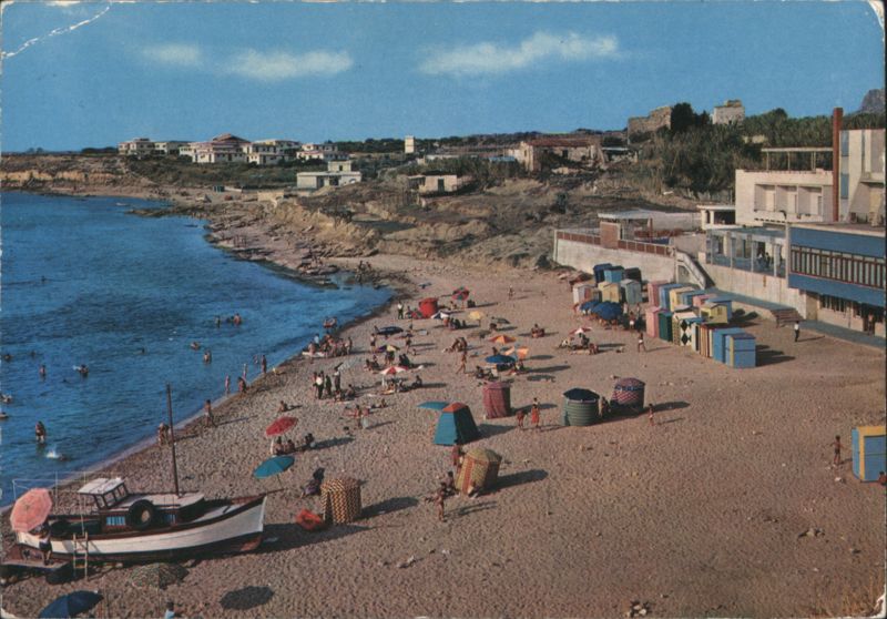 Terrasini Beach with Colorful Umbrellas and Boat Italy