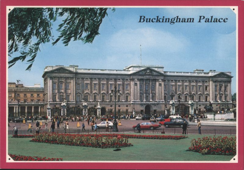 Buckingham Palace with Flower Gardens and Traffic London United Kingdom