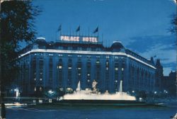 Palace Hotel and Neptune Fountain at Night Postcard