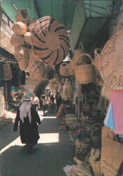 Old City Street Scene with Woven Baskets Postcard