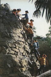 A Young Hiker Going Upward Courageously Postcard