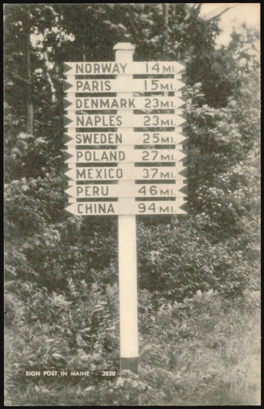 Sign Post in Maine with Distances to World Cities