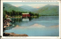 Surrounding Mountains Reflected in Grand Lake, Colorado Postcard