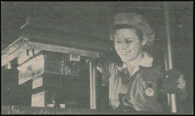 Woman Operating Industrial Machine in Kansas Factory Topeka