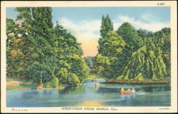 Scenic River View with Rowboats Postcard