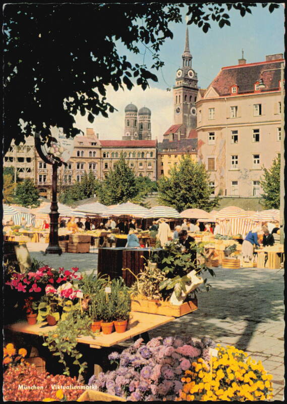 Viktualienmarkt Market Scene with Church Towers, Munich Germany