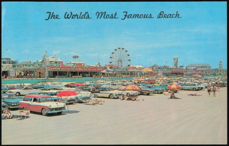 Boardwalk and Beach Crowd with Cars and Ferris Wheel Daytona Beach Florida