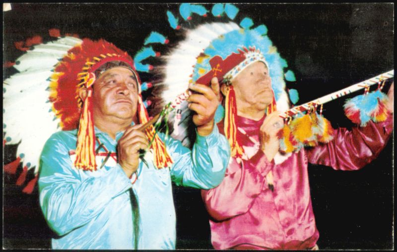 Native American Men in Traditional Regalia with Headdresses