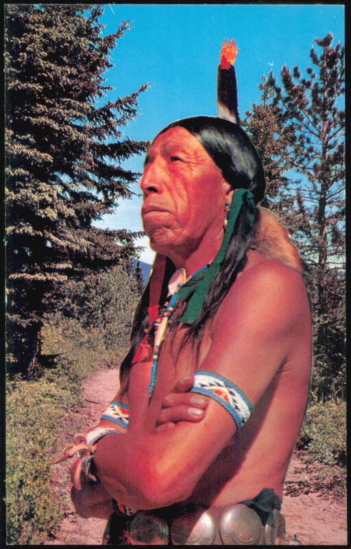 Native American Man with Feather and Traditional Jewelry