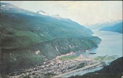 Aerial view of Skagway and surrounding mountains Postcard