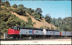 Amtrak Train 568 and 566 on Tracks near Hills Postcard