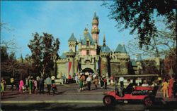 Sleeping Beauty's Castle and Horseless Carriage Postcard