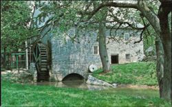 Mill Bridge Craft Village Stone Mill with Water Wheel Postcard