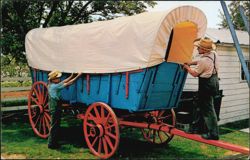 Amish Carriagemakers Restoring an Old Covered Wagon Postcard