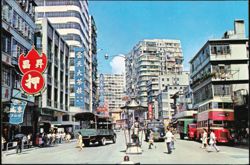 Busy Street Scene with Red Double Decker Bus Postcard