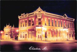 Henry County Museum and DeLozier Building at Night Postcard