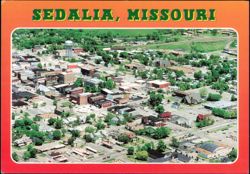 Aerial view of downtown and water tower Postcard