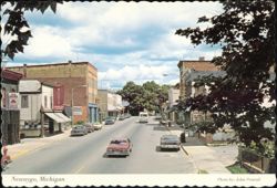 Street Scene with Downtown Buildings and Classic Cars Postcard