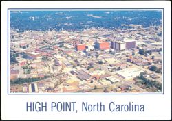 Aerial view of downtown industrial and commercial district Postcard