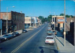 Downtown Street View with Rexall Drugs Postcard